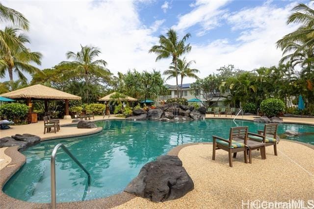 92-1037D Koio Dr Unit M1-4, Kapolei, HI 96707 - community pool with a patio area and a gazebo