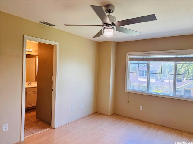 91-1014 Kaipalaoa St Unit 6504, Ewa Beach, HI 96706 - empty room with light wood-style floors and a ceiling fan