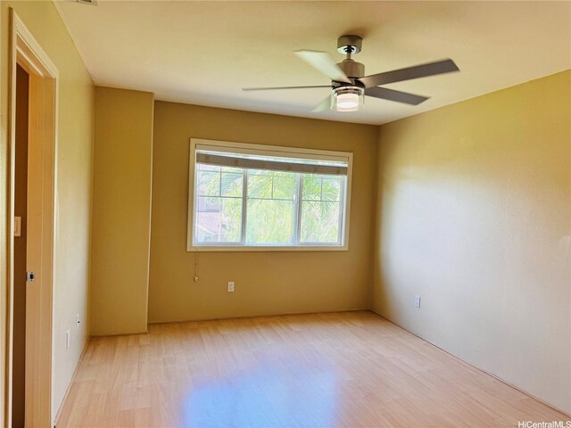 91-1014 Kaipalaoa St Unit 6504, Ewa Beach, HI 96706 - spare room with light wood-style floors and a ceiling fan