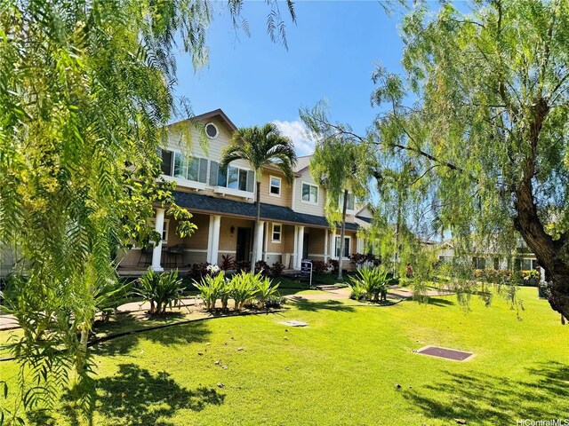 91-1014 Kaipalaoa St Unit 6504, Ewa Beach, HI 96706 - back of house with a yard and a porch