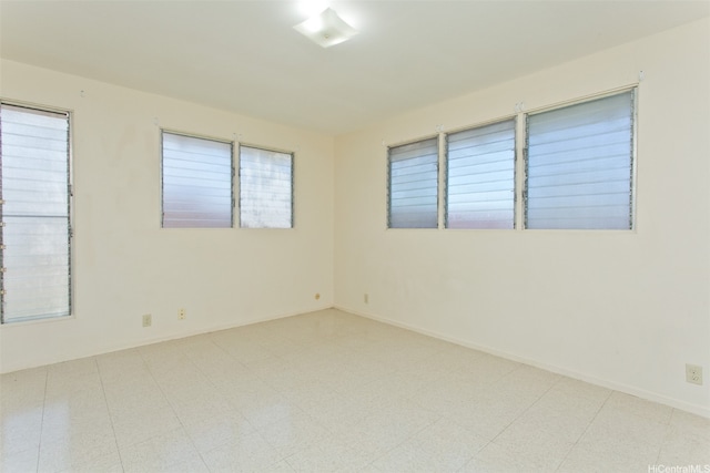 3516 Ala Aloalo Pl, Honolulu, HI 96818 - unfurnished room featuring plenty of natural light and tile patterned floors