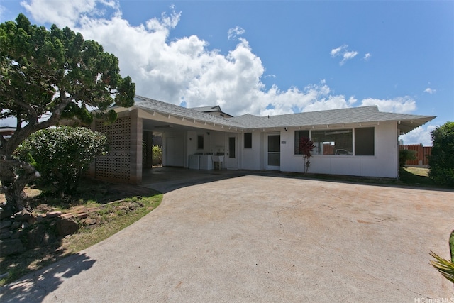 3516 Ala Aloalo Pl, Honolulu, HI 96818 - view of front of house featuring driveway, a shingled roof, a carport, and stucco siding