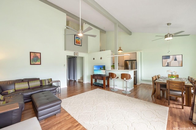46-034 Puulena St Unit 722, Kaneohe, HI 96744 - living area with a ceiling fan, high vaulted ceiling, wood finished floors, and beamed ceiling