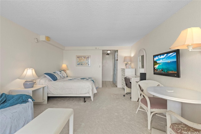 445 Seaside Ave Unit 3704, Honolulu, HI 96815 - bedroom with light carpet and a textured ceiling