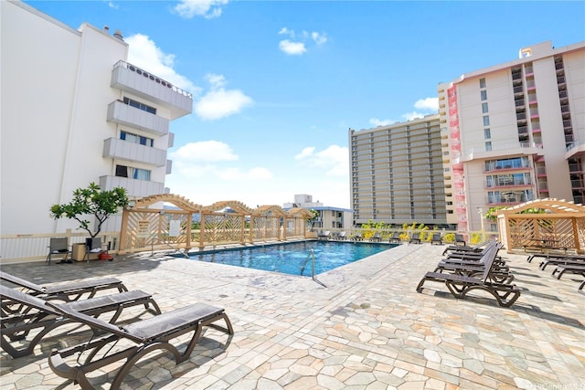 445 Seaside Ave Unit 3704, Honolulu, HI 96815 - community pool with a patio area