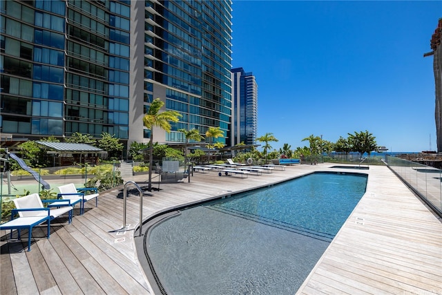 1001 Queen St Unit 1815, Honolulu, HI 96814 - community pool featuring a wooden deck