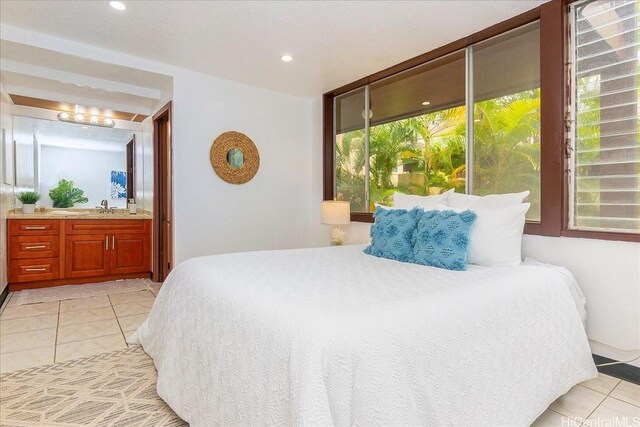 98-380 Koauka Loop Unit 304, Aiea, HI 96701 - bedroom with light tile patterned flooring, a sink, ensuite bath, and recessed lighting