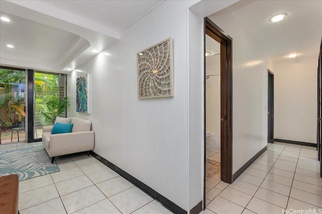 98-380 Koauka Loop Unit 304, Aiea, HI 96701 - hallway featuring light tile patterned flooring, baseboards, and recessed lighting