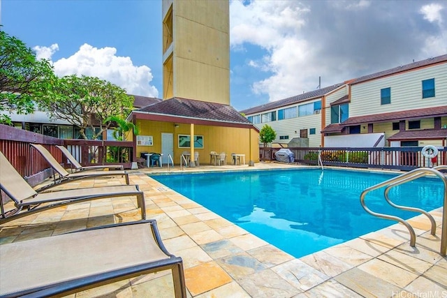 98-380 Koauka Loop Unit 304, Aiea, HI 96701 - community pool with a patio