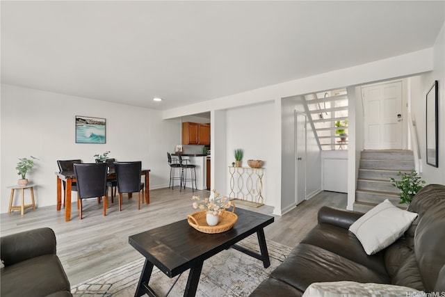 92-956 Makakilo Dr Unit 65, Kapolei, HI 96707 - living room featuring light wood finished floors, stairs, recessed lighting, and baseboards