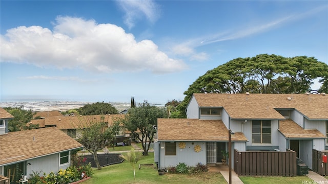 92-956 Makakilo Dr Unit 65, Kapolei, HI 96707 - view of home's exterior featuring roof with shingles