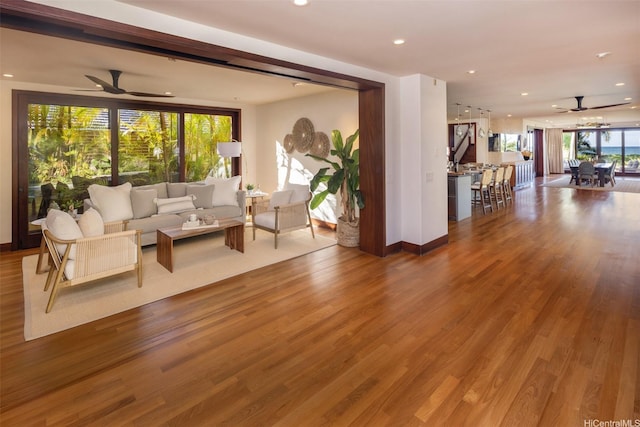958 Mokulua Dr, Kailua, HI 96734 - living room with ceiling fan, wood finished floors, and recessed lighting