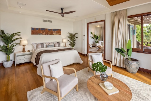 958 Mokulua Dr, Kailua, HI 96734 - bedroom with wood finished floors, baseboards, and ceiling fan