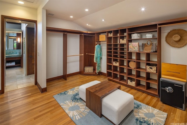 958 Mokulua Dr, Kailua, HI 96734 - sitting room featuring baseboards, vaulted ceiling, light wood-style flooring, and recessed lighting