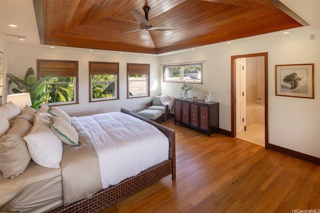 958 Mokulua Dr, Kailua, HI 96734 - bedroom with wooden ceiling, a raised ceiling, light wood finished floors, baseboards, and ensuite bath