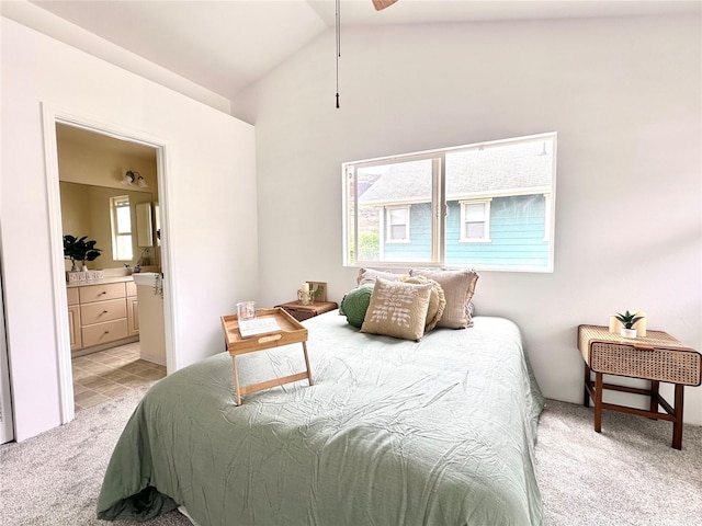 87-1976 Pakeke St Unit 5N, Waianae, HI 96792 - bedroom featuring light colored carpet, multiple windows, high vaulted ceiling, and connected bathroom