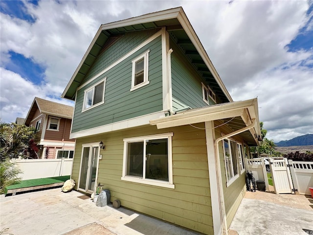 87-1976 Pakeke St Unit 5N, Waianae, HI 96792 - rear view of property with a patio and a mountain view
