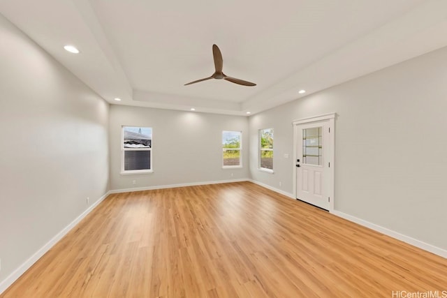 15-1503 26th Ave, Keaau, HI 96749 - spare room featuring a tray ceiling, a ceiling fan, light wood finished floors, recessed lighting, and baseboards