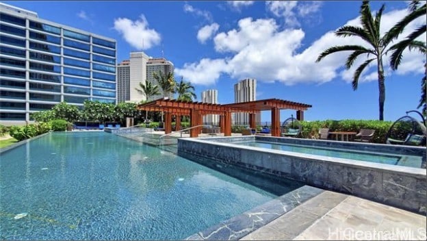 1555 Kapiolani Blvd Unit 1514, Honolulu, HI 96814 - view of pool with an in-ground hot tub, an infinity pool, and a pergola