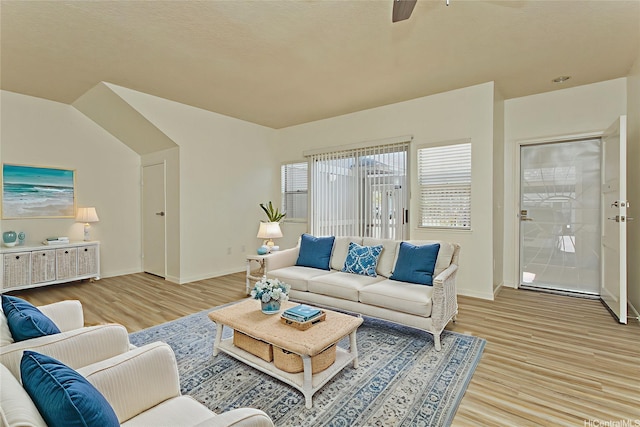 95-1030 Ainamakua Dr Unit 4, Mililani, HI 96789 - living room with light wood-style flooring, a ceiling fan, and baseboards
