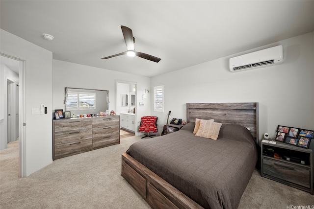 91-1811 Kapeku Loop, Ewa Beach, HI 96706 - bedroom with a wall unit AC, light carpet, a ceiling fan, and connected bathroom