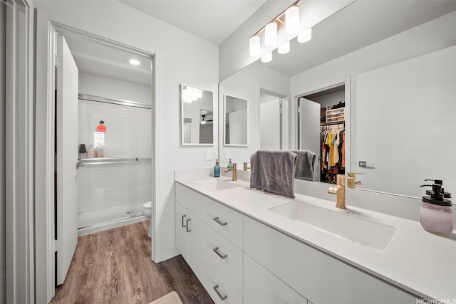 91-1811 Kapeku Loop, Ewa Beach, HI 96706 - full bath featuring double vanity, a shower stall, wood finished floors, and a spacious closet