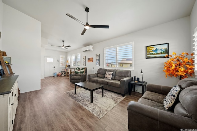 91-1811 Kapeku Loop, Ewa Beach, HI 96706 - living room with ceiling fan, wood finished floors, a wall mounted AC, and vaulted ceiling