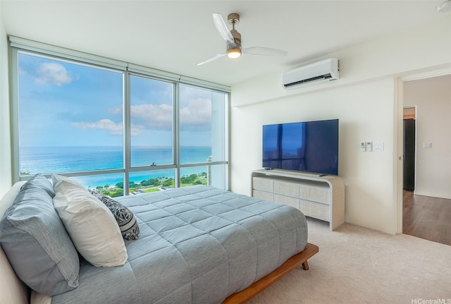 1391 Kapiolani Blvd Unit 4111, Honolulu, HI 96814 - bedroom with an AC wall unit, a ceiling fan, carpet flooring, and a wall of windows