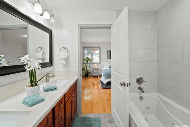 4162 Puu Panini Ave Unit A, Honolulu, HI 96816 - bathroom with connected bathroom, double vanity, and a combined bath / shower with jetted tub
