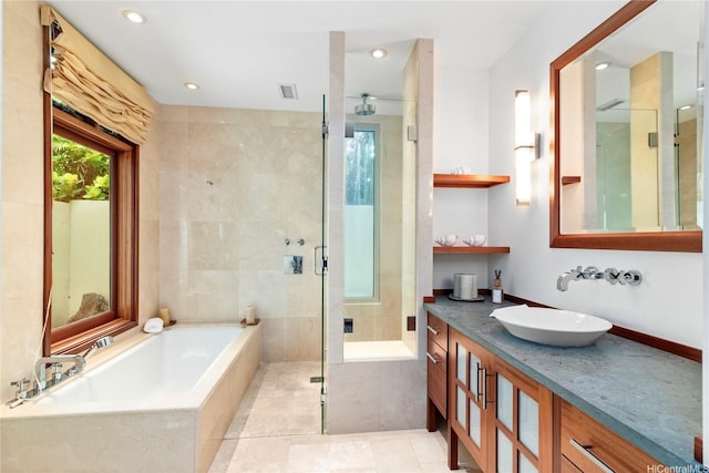 4498 Pahoa Ave, Honolulu, HI 96816 - full bath featuring a bath, a shower stall, vanity, recessed lighting, and tile patterned floors
