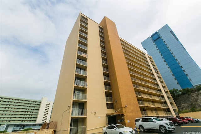 801 Ala Nioi Pl Unit 706, Honolulu, HI 96818 - view of apartment building / complex with uncovered parking
