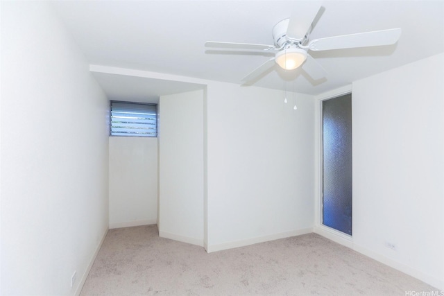 801 Ala Nioi Pl Unit 706, Honolulu, HI 96818 - carpeted empty room with baseboards and ceiling fan