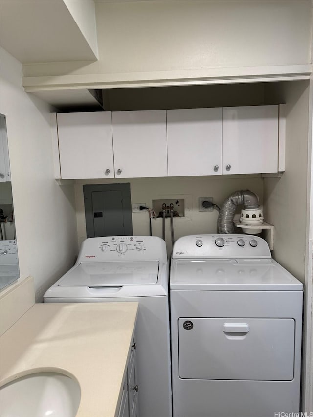 1717 Ala Wai Blvd Unit 501, Honolulu, HI 96815 - laundry area featuring cabinet space, washer and dryer, and electric panel