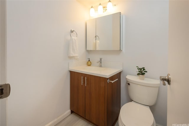 2233 Ala Wai Blvd Unit 10C, Honolulu, HI 96815 - bathroom featuring vanity and toilet