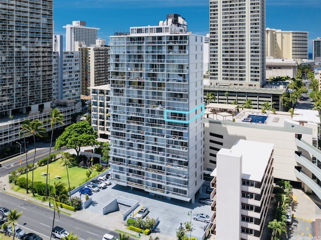 2233 Ala Wai Blvd Unit 10C, Honolulu, HI 96815 - view of building exterior featuring a city view