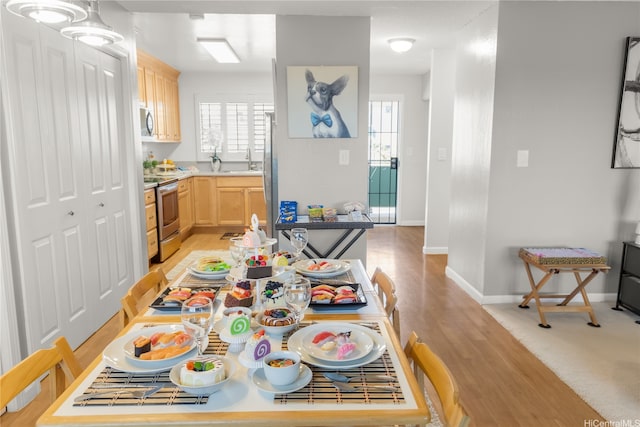 4280 Salt Lake Blvd Unit D23, Honolulu, HI 96818 - dining area featuring light wood-style flooring