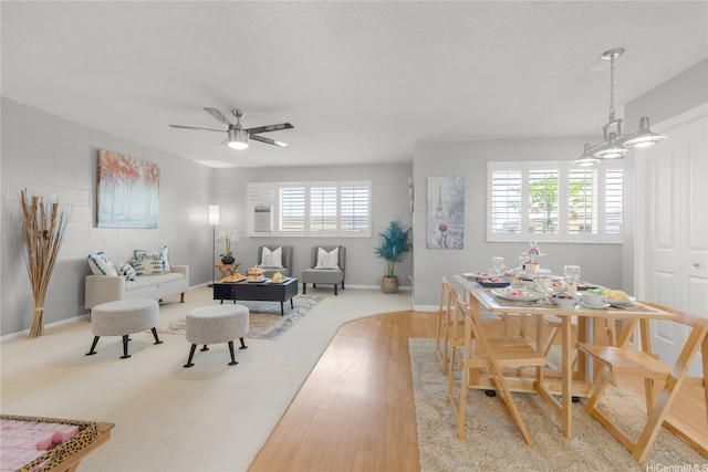 4280 Salt Lake Blvd Unit D23, Honolulu, HI 96818 - dining space with wood finished floors, a ceiling fan, and baseboards