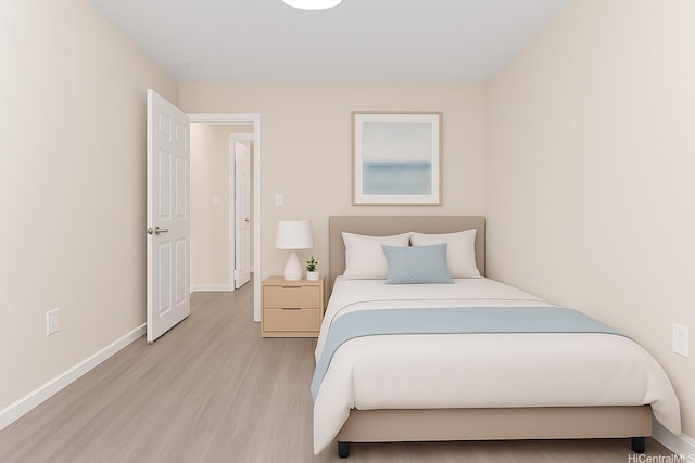 98-297 Ualo St Unit W1, Aiea, HI 96701 - bedroom with light wood-style flooring and baseboards