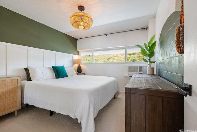 1520 Ward Ave Unit 902, Honolulu, HI 96822 - bedroom featuring light colored carpet and wainscoting