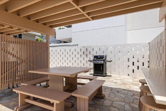 1520 Ward Ave Unit 902, Honolulu, HI 96822 - view of patio featuring outdoor dining area and grilling area
