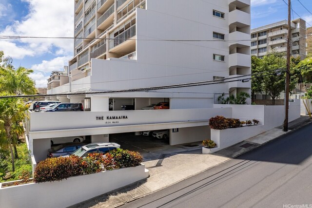 1520 Ward Ave Unit 902, Honolulu, HI 96822 - view of apartment building / complex with a parking lot