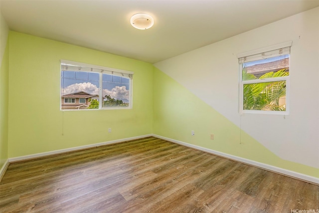 91-1019 Kai Uhu St, Ewa Beach, HI 96706 - unfurnished room featuring wood finished floors and baseboards