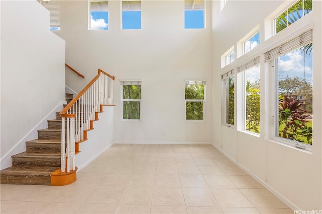 91-1019 Kai Uhu St, Ewa Beach, HI 96706 - stairway with a towering ceiling and tile patterned flooring