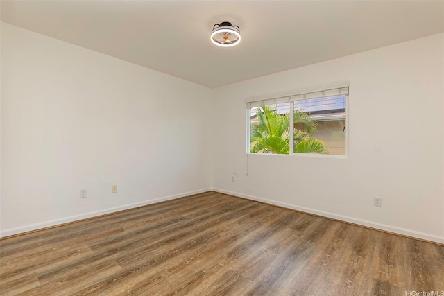 91-1019 Kai Uhu St, Ewa Beach, HI 96706 - unfurnished room featuring wood finished floors and baseboards