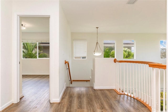 91-1019 Kai Uhu St, Ewa Beach, HI 96706 - hallway with an upstairs landing and wood finished floors