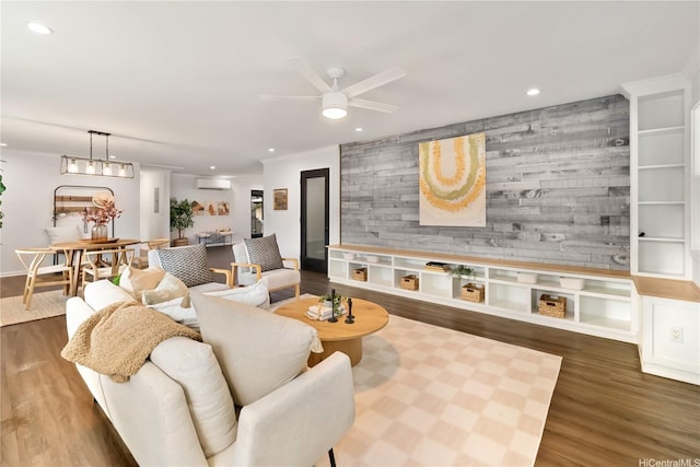 45-237 Popoki Pl, Kaneohe, HI 96744 - living room with an AC wall unit, wood finished floors, a ceiling fan, recessed lighting, and an accent wall