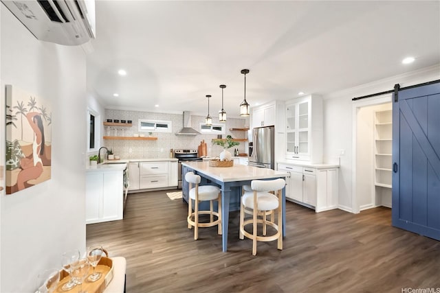 45-237 Popoki Pl, Kaneohe, HI 96744 - kitchen with stainless steel appliances, open shelves, a barn door, wall chimney exhaust hood, and a wall unit AC