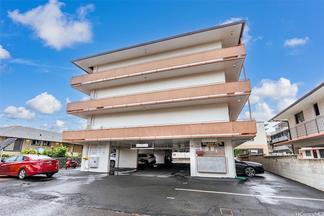 636 Nalanui St Unit 302, Honolulu, HI 96817 - view of property featuring uncovered parking