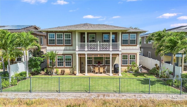 91-1099 Waikai St, Ewa Beach, HI 96706 - back of house with a shingled roof, a balcony, stucco siding, and a patio area