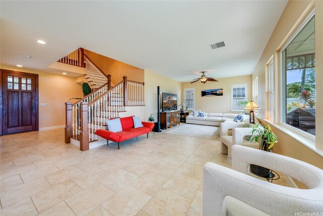 91-1099 Waikai St, Ewa Beach, HI 96706 - living area featuring stairs, a ceiling fan, recessed lighting, and baseboards